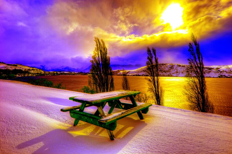 Green Picnic Table in Snow