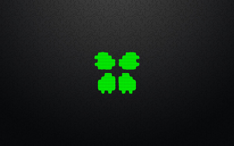 green pixel art icons on dark background