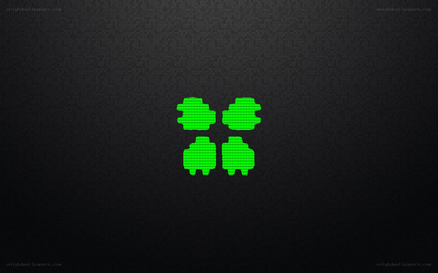 green pixel art icons on dark background
