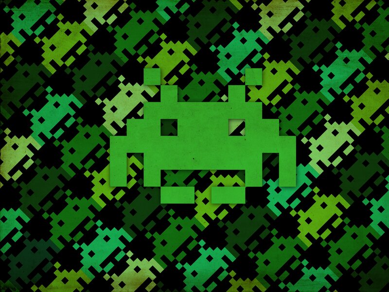 green pixelated alien graphic