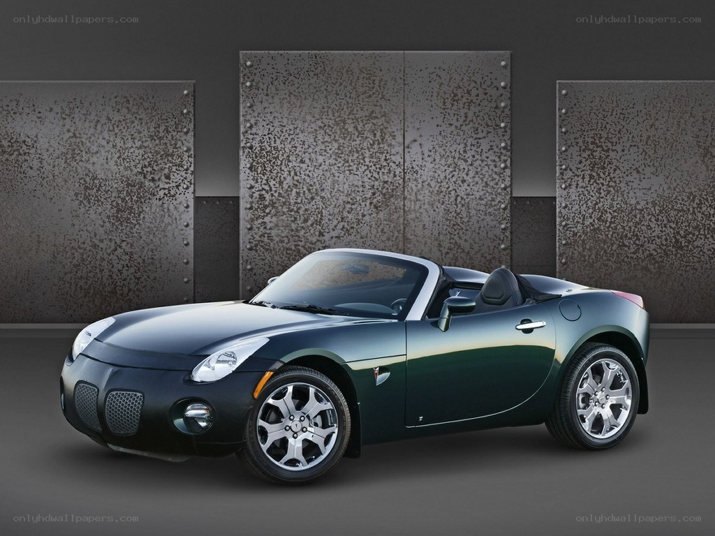 Green Pontiac Solstice convertible