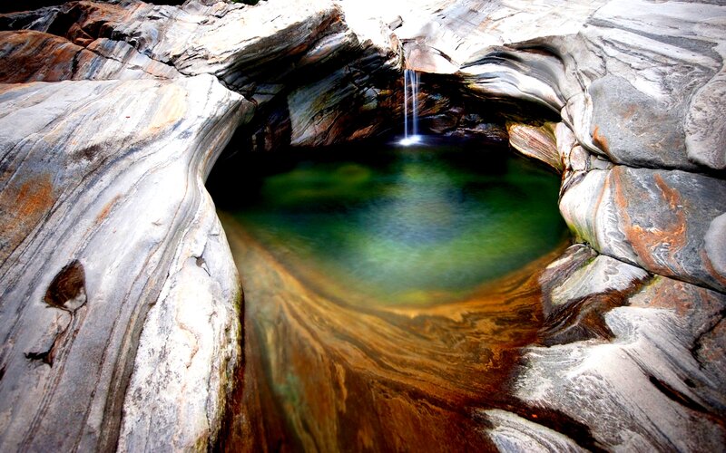 Green Pool in Rock Formation