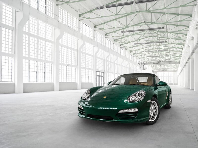 Green Porsche Boxster in a warehouse