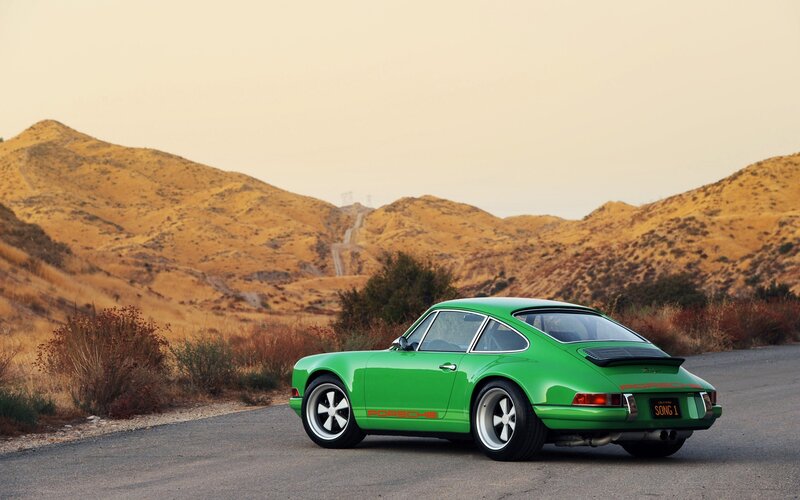 Green Porsche Car — Serene, Sunset, Photograph