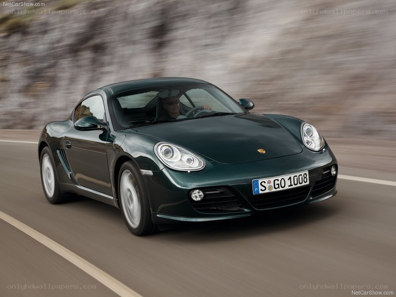 Green Porsche Cayman in motion