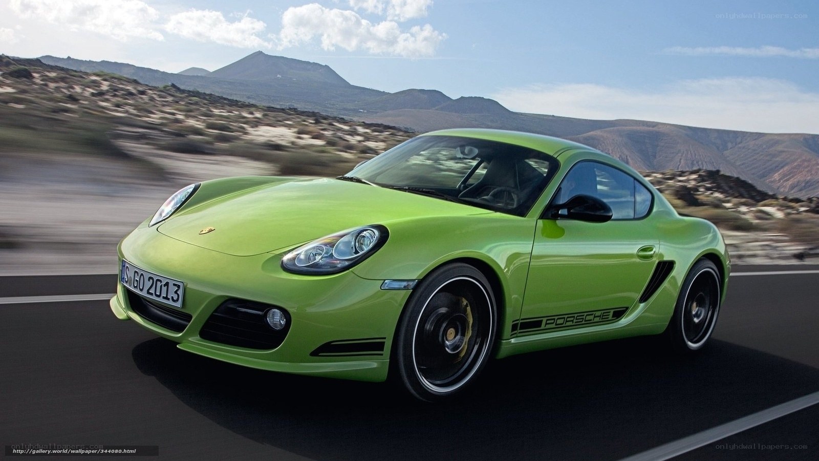 Green Porsche Cayman in motion