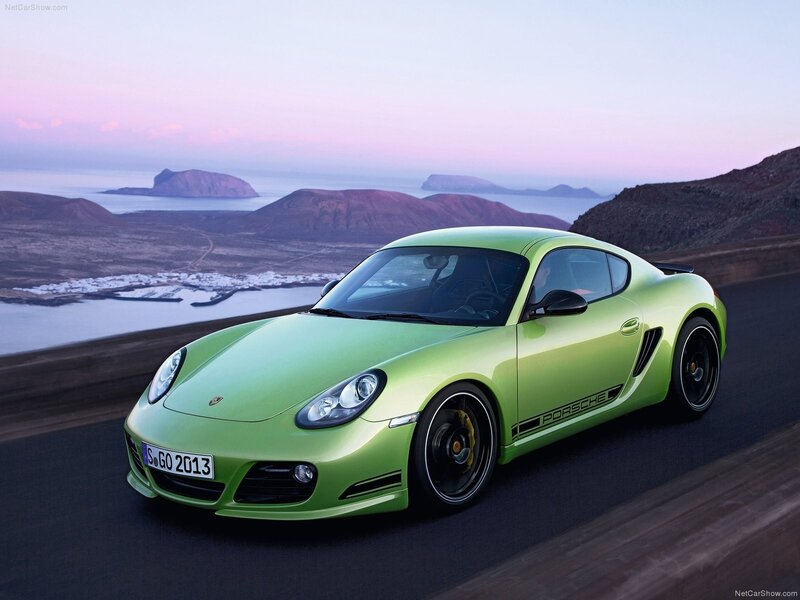 Green Porsche Cayman in scenic drive