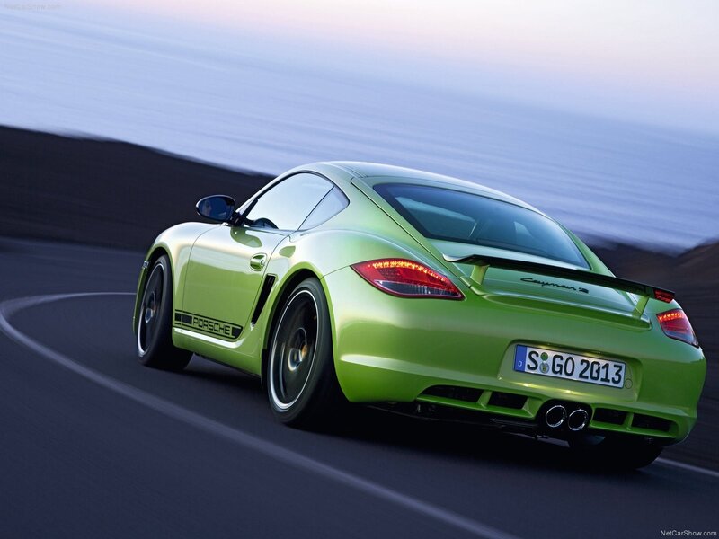 green porsche cayman s driving