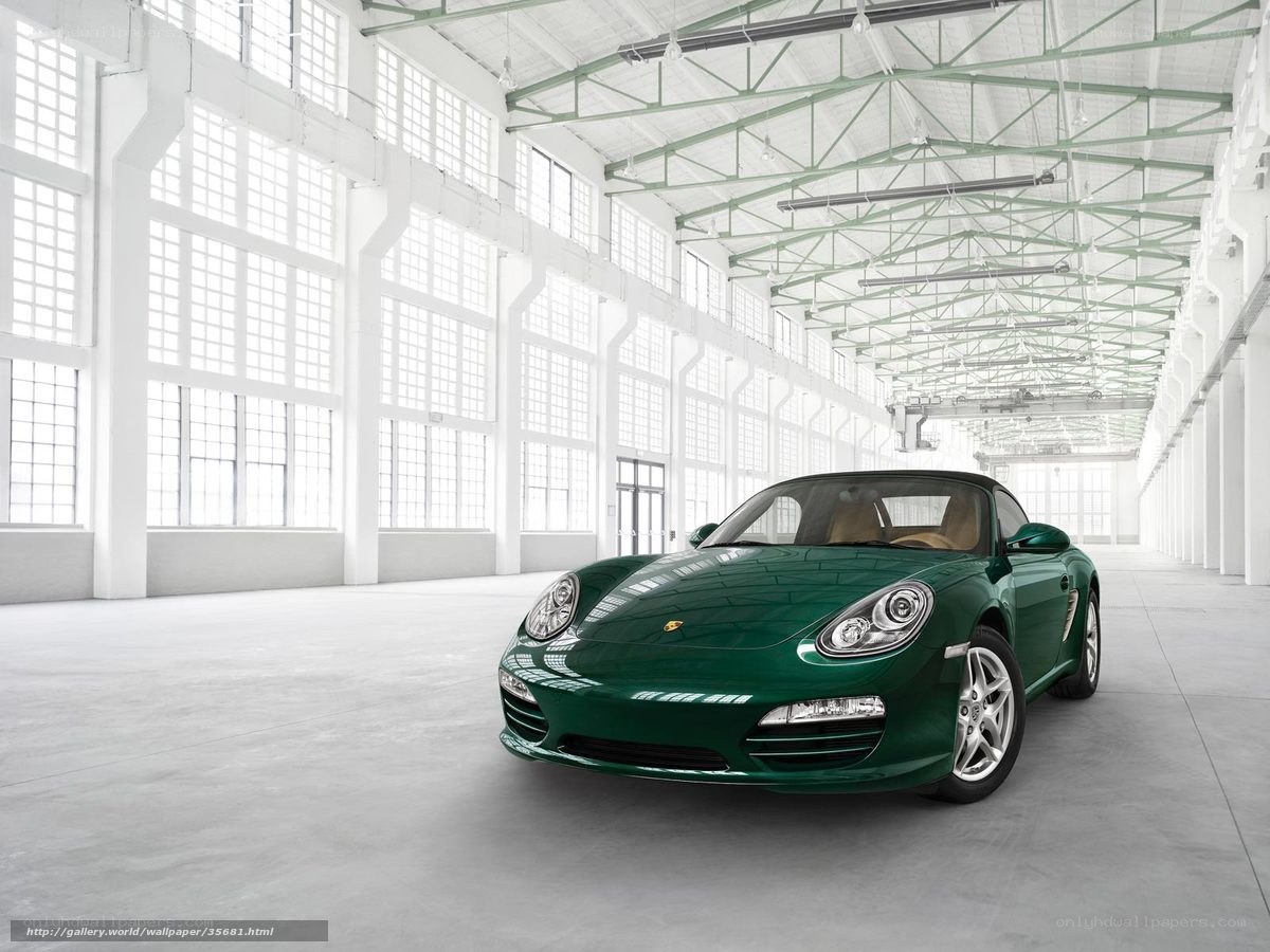 Green Porsche in a warehouse