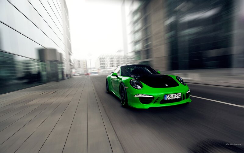 green porsche in city