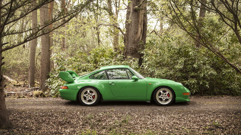 Green Porsche in Forest
