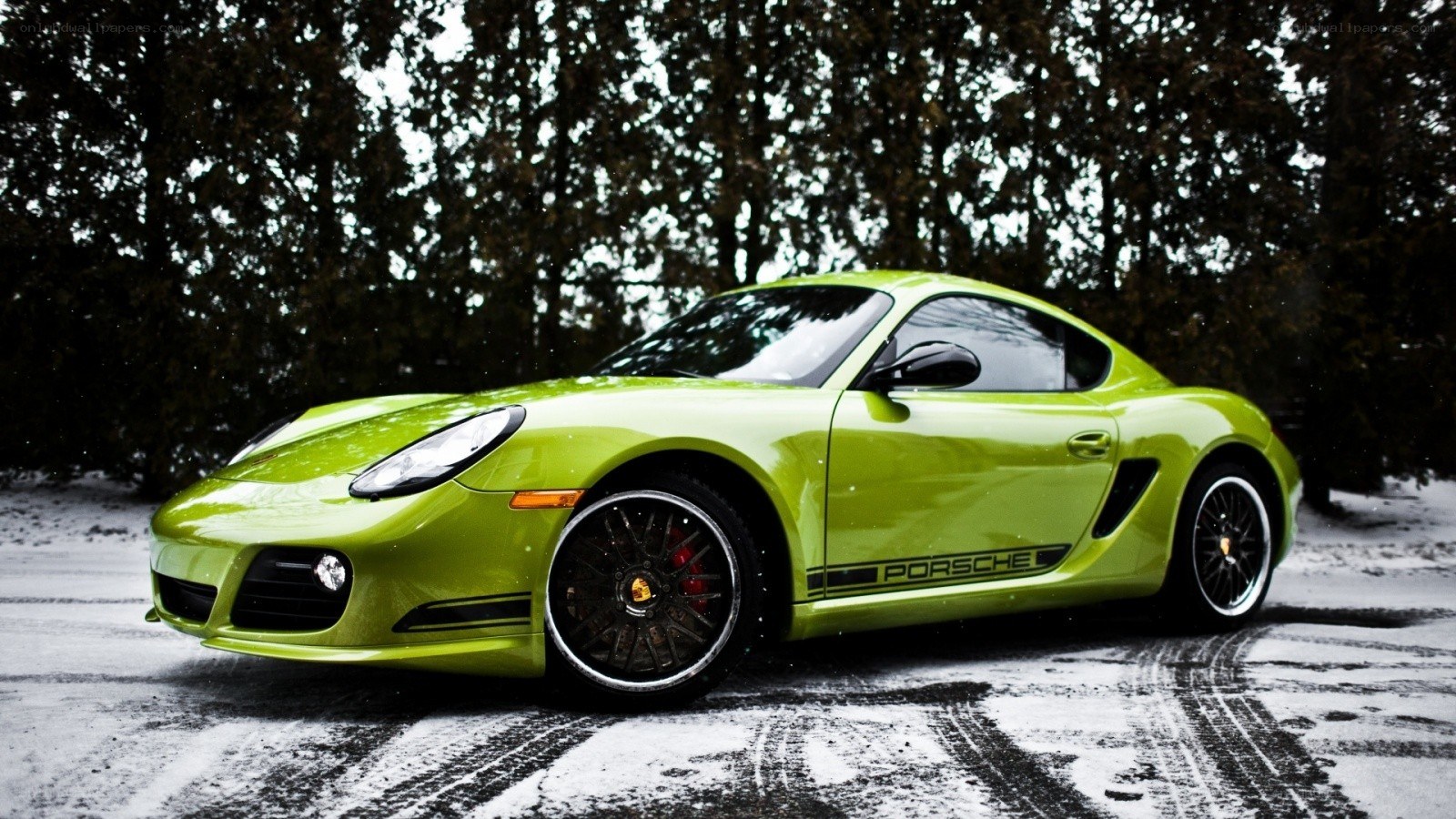 green porsche in snow