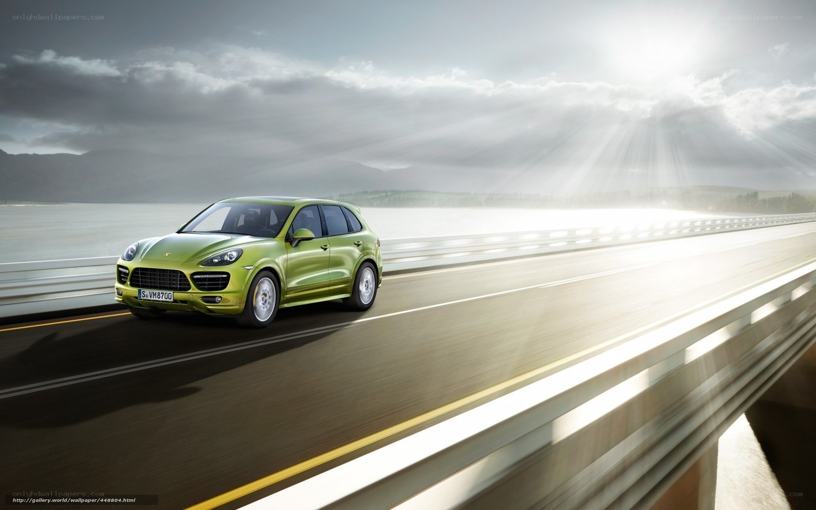 Green Porsche on a bridge