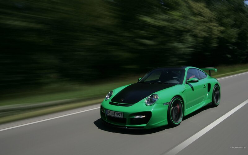 green porsche on a road