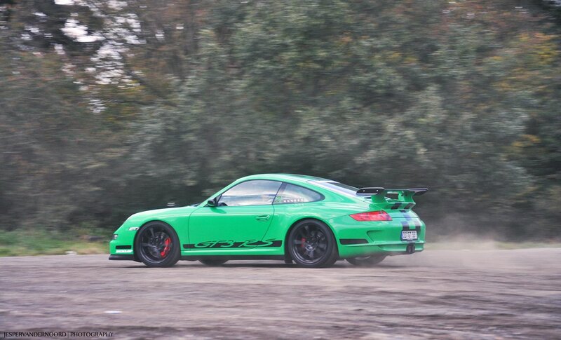 green porsche on a track