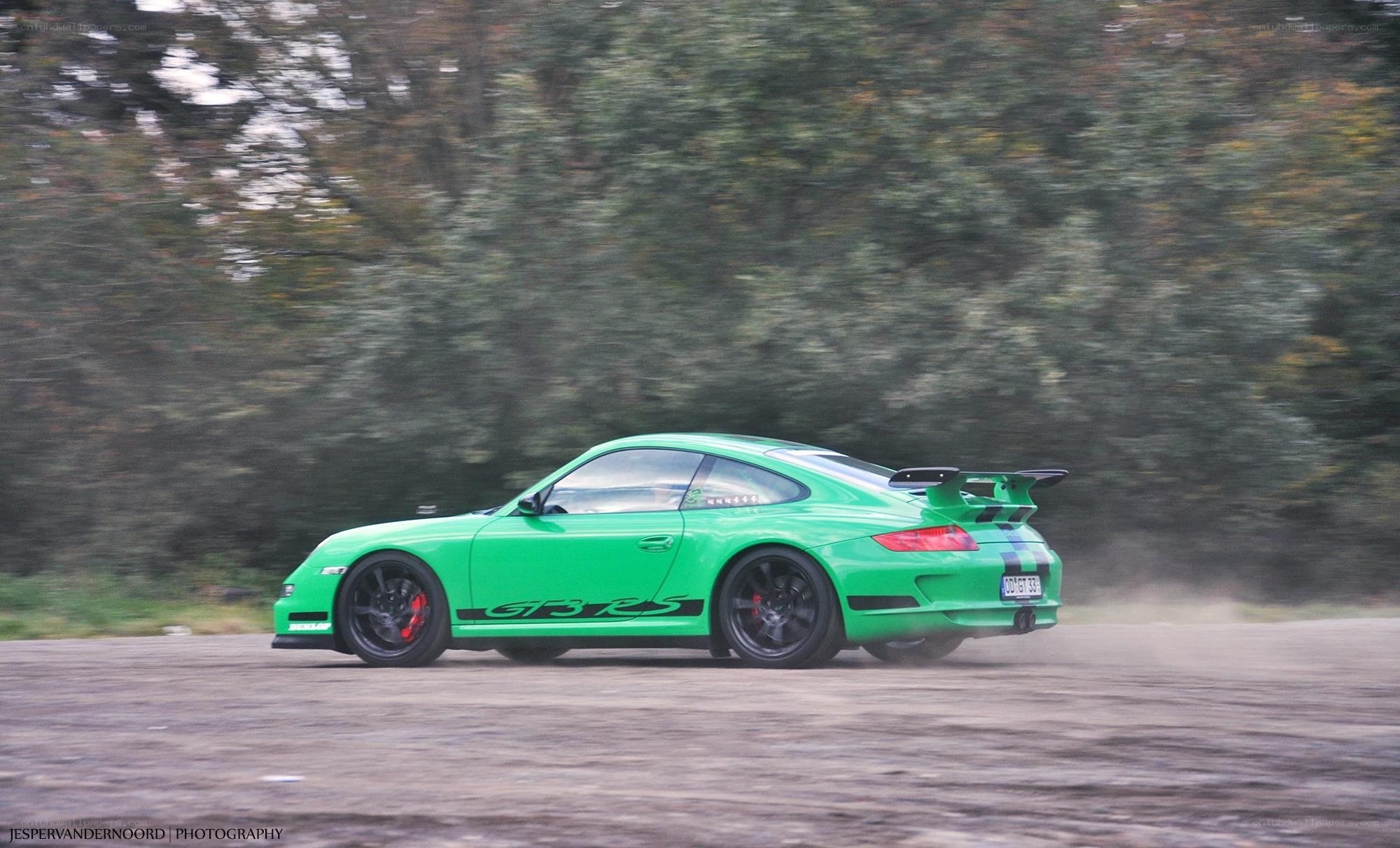 green porsche on a track