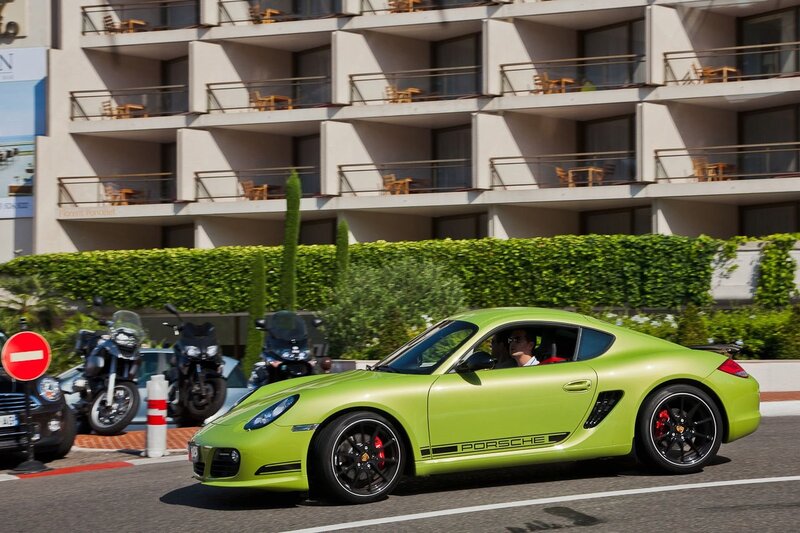 Green Porsche on city street