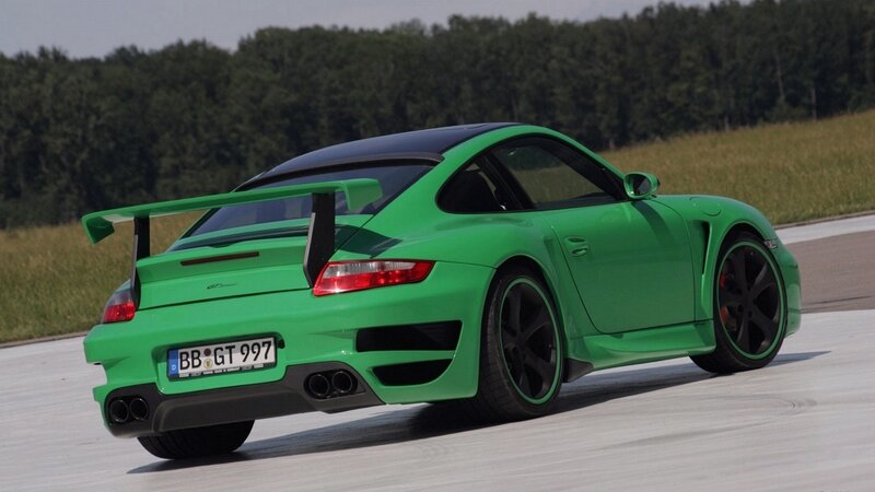 green porsche on racetrack