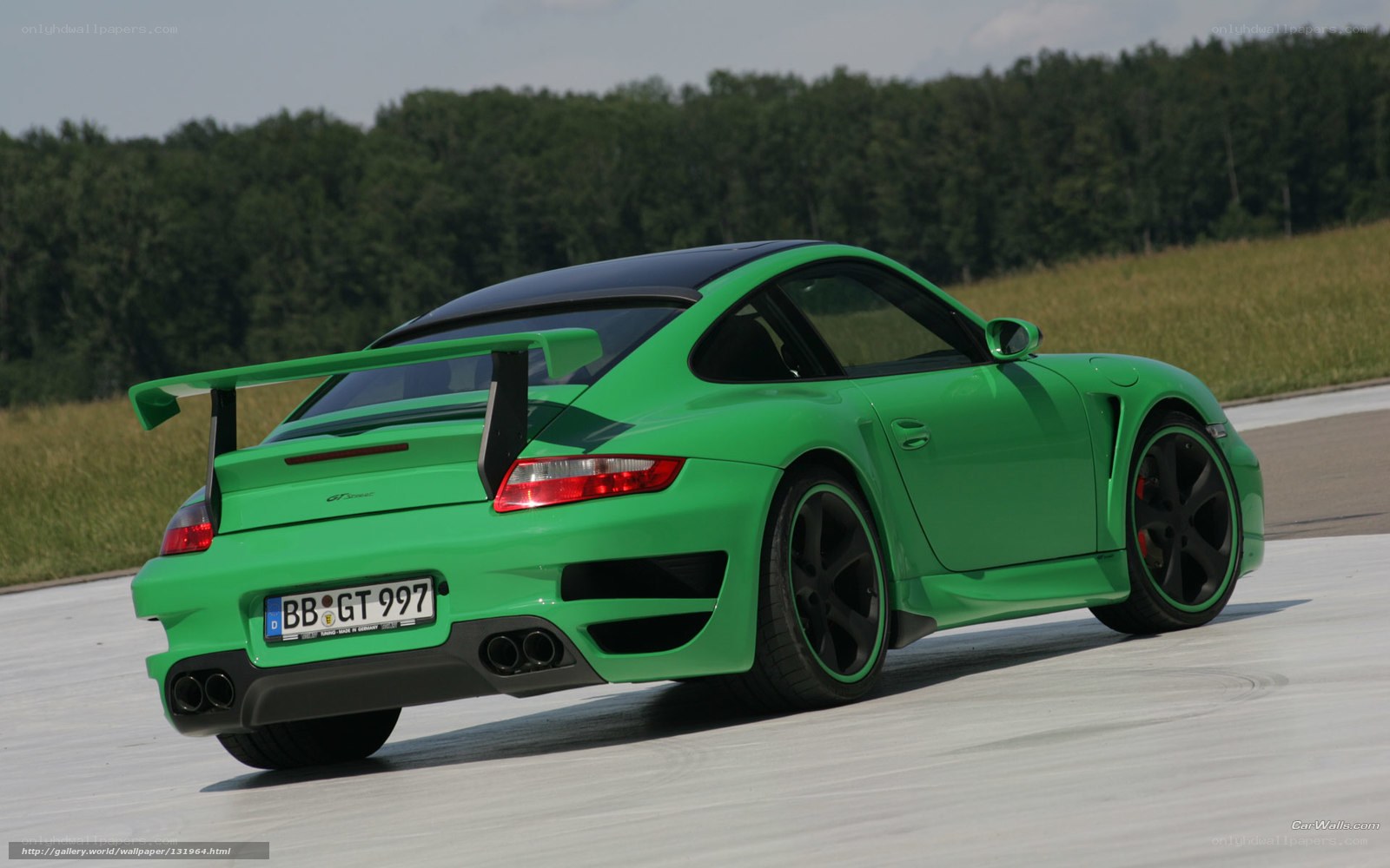green porsche on racetrack