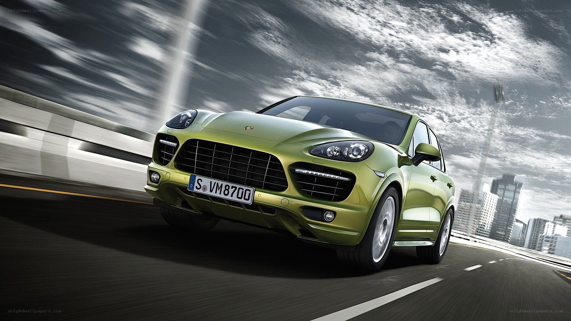 green porsche suv in motion