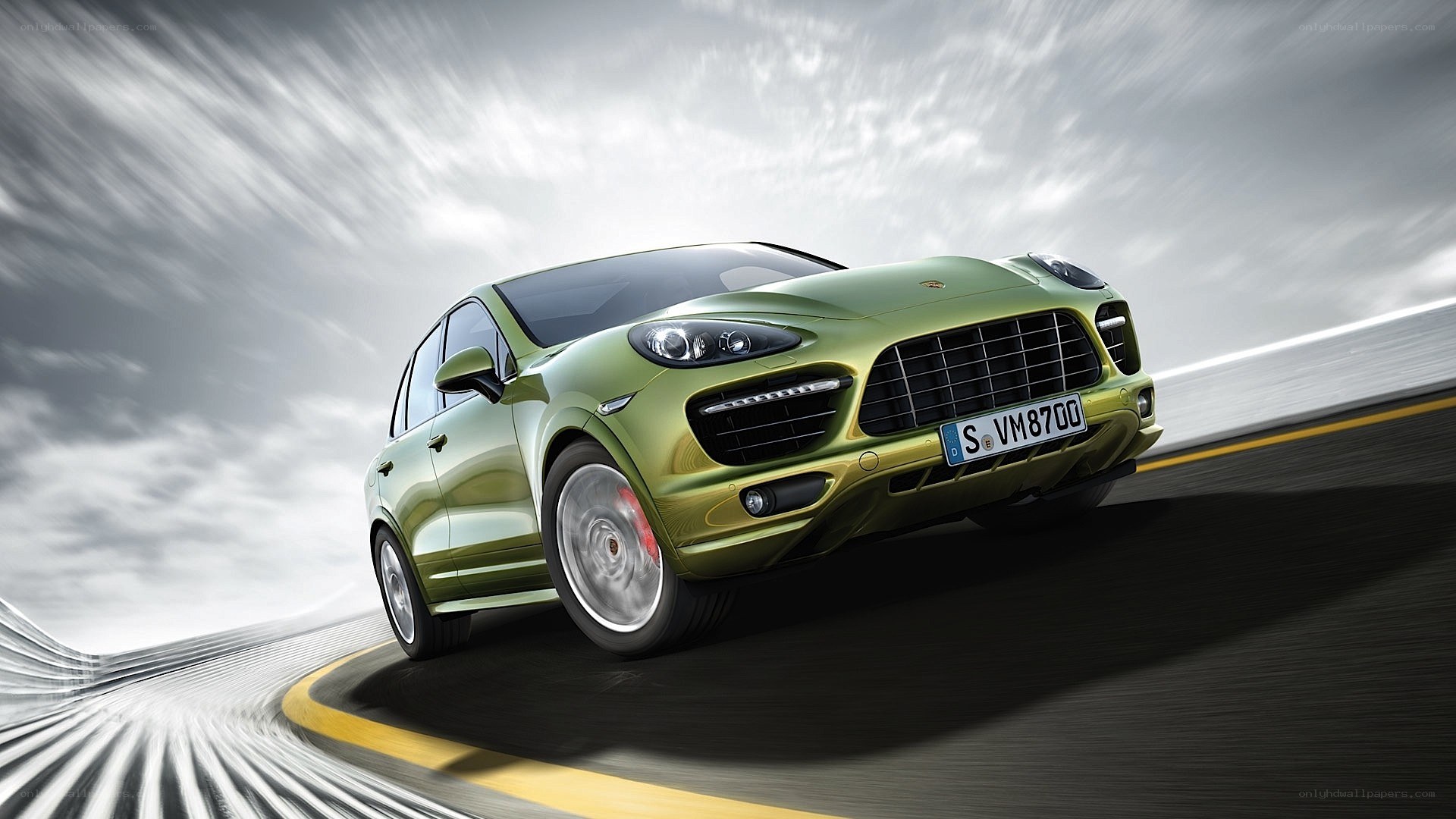 green porsche suv in motion
