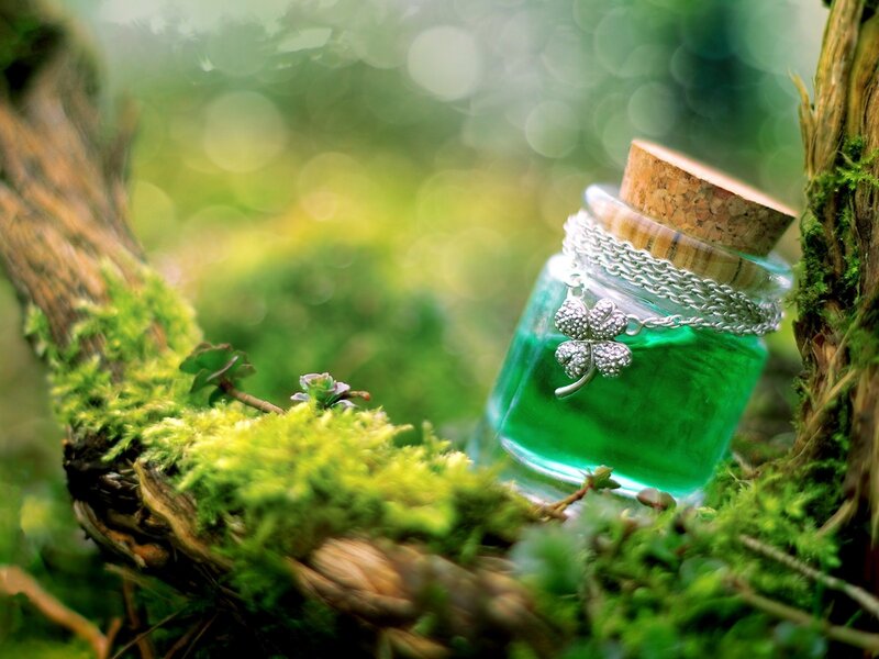 green potion in forest setting