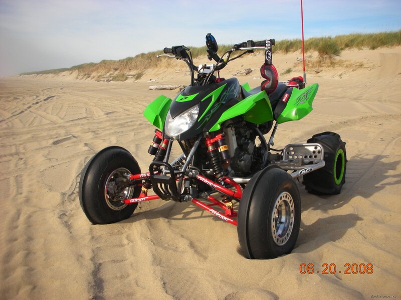 Green Quad Bike on Beach
