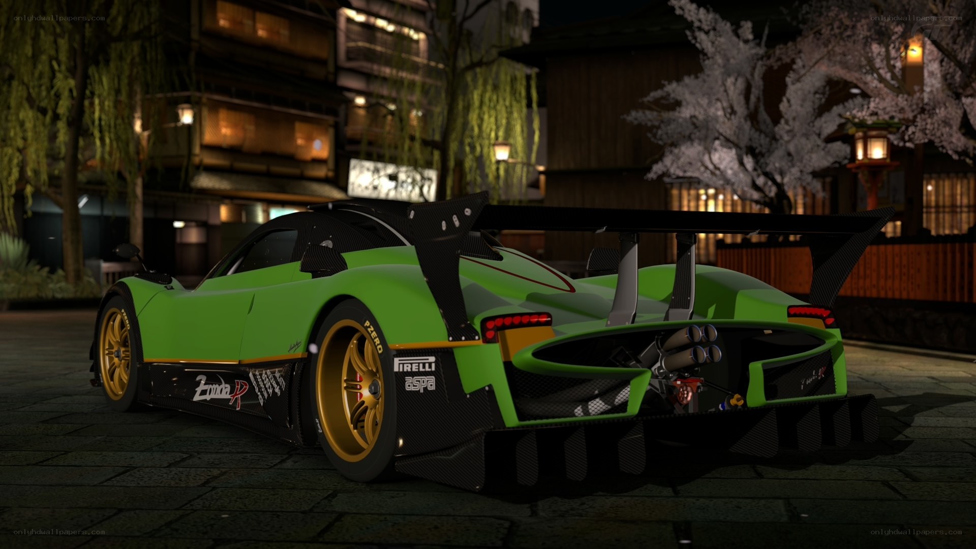 green race car at night