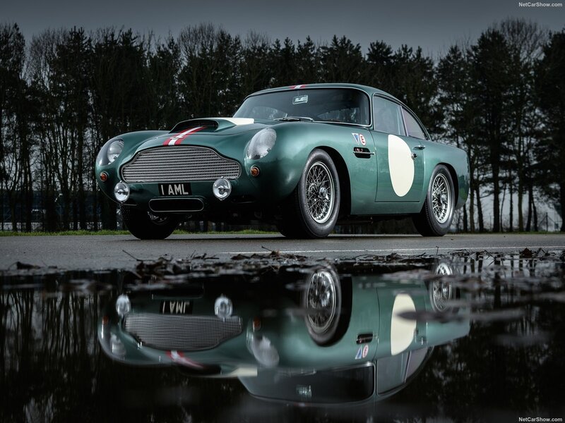 Green Race Car — Dramatic, Afternoon, Photograph, Puddle