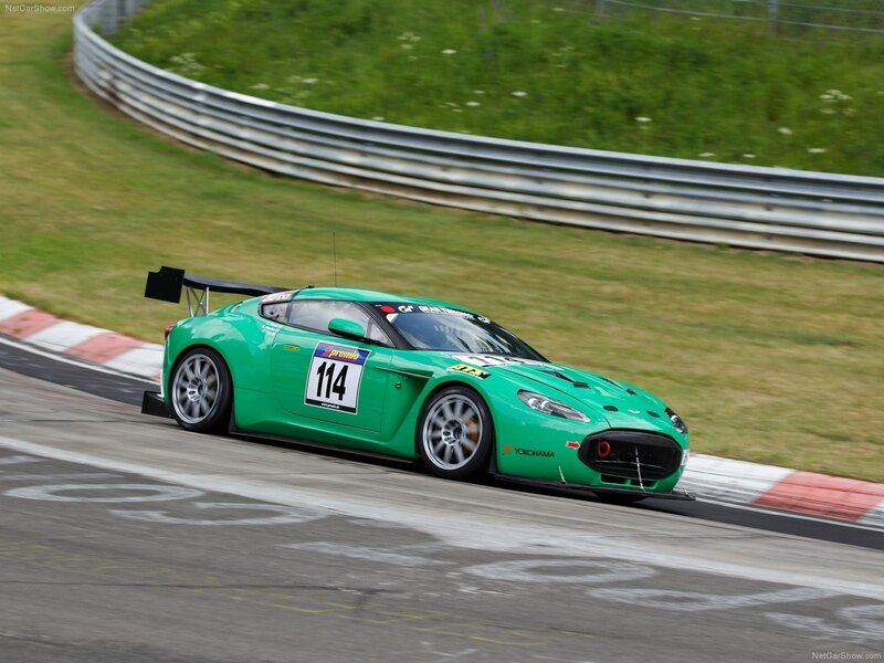 Green Race Car — Dynamic, Afternoon, Photograph, Race Track, Guardrail