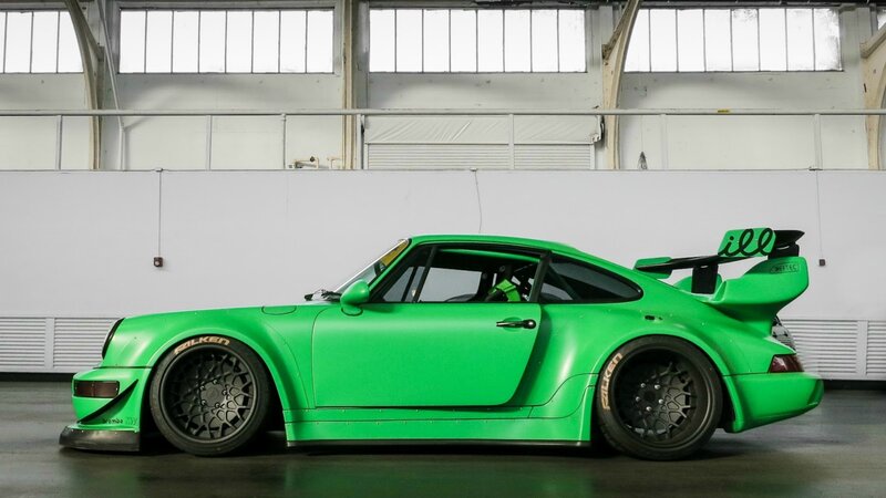 green race car in garage