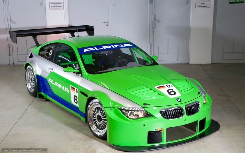 green race car in garage