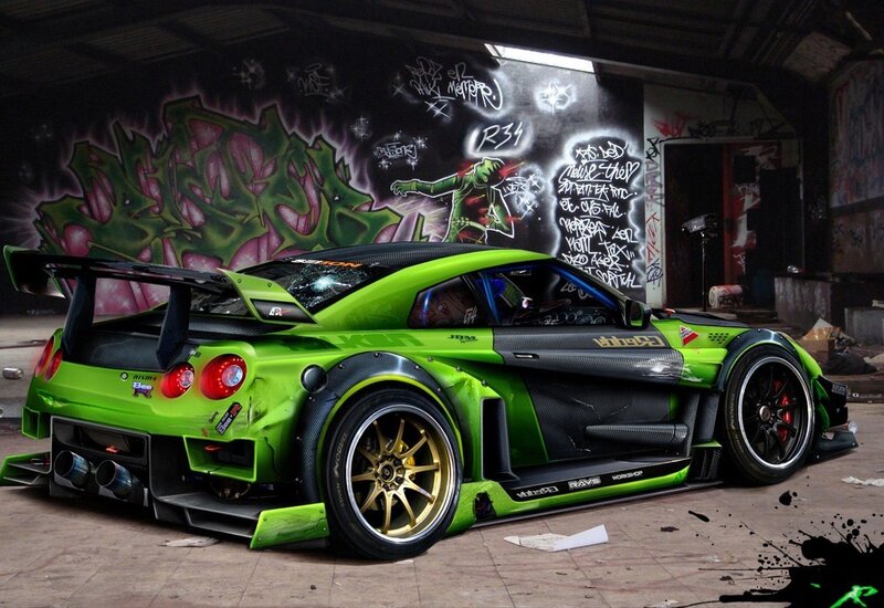 green race car in graffiti garage
