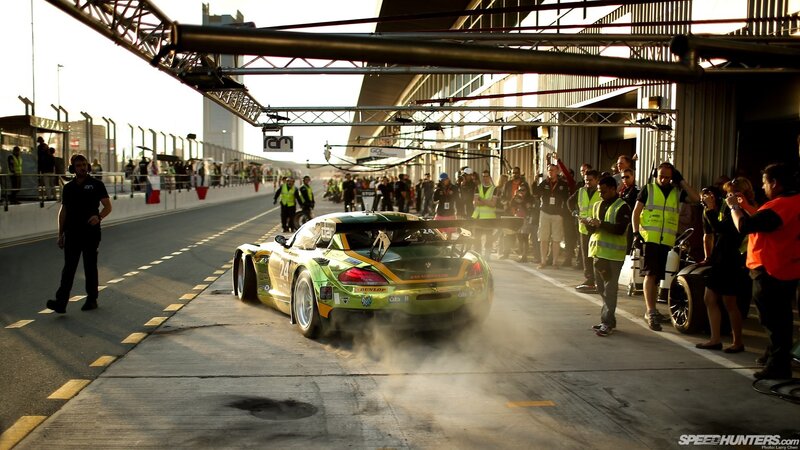 Green Race Car in Pit Lane