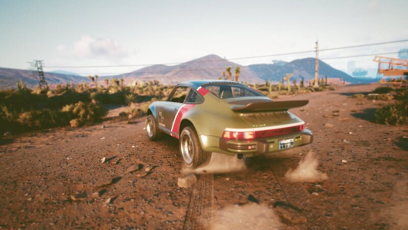 Green Race Car on Dirt