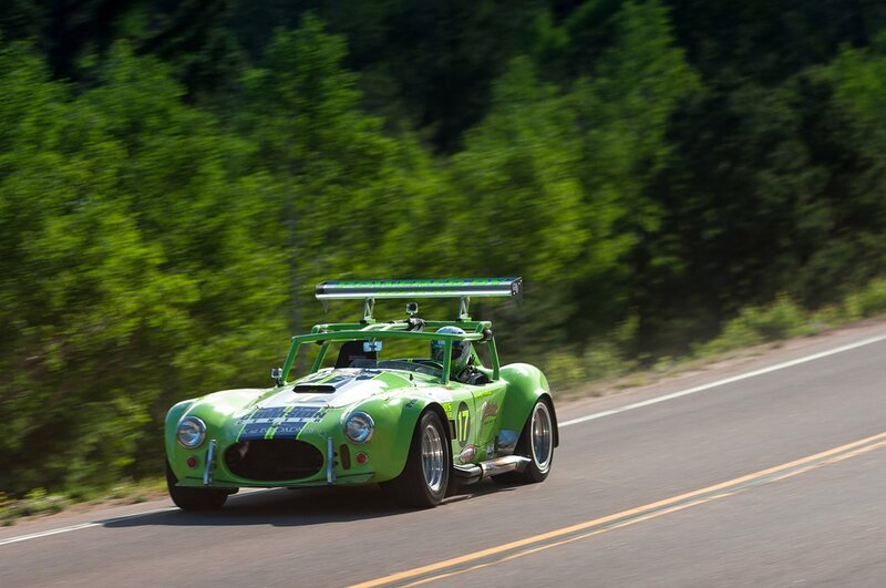 green race car on road