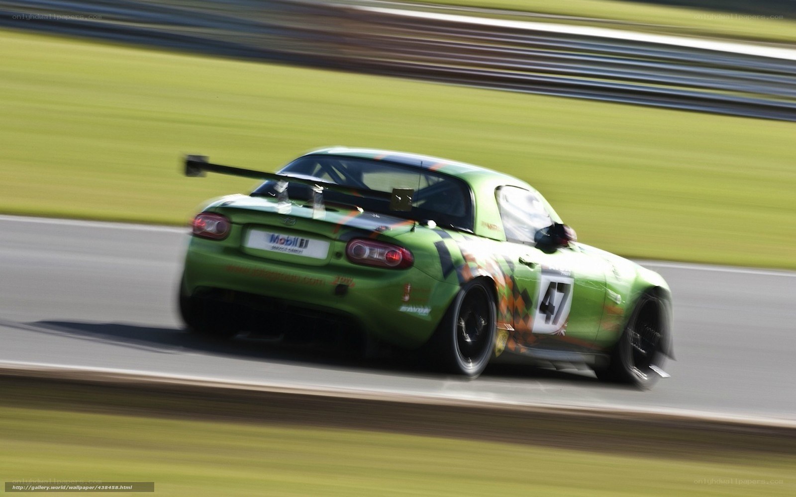 green race car on track