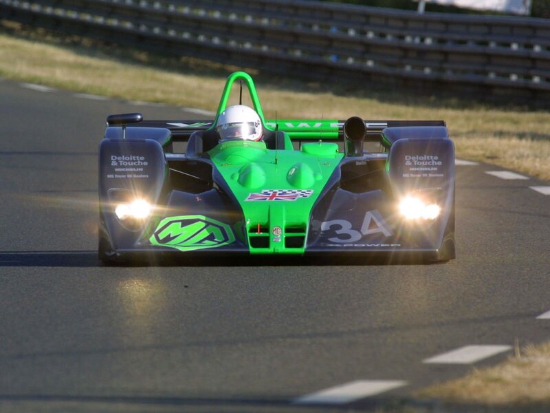 green race car on track
