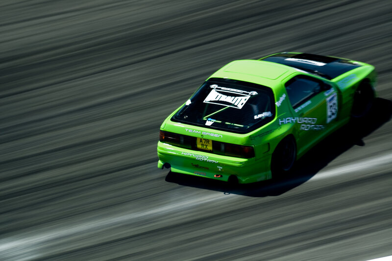 green race car on track