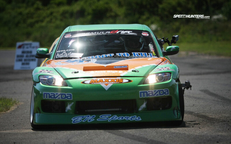 green race car on track
