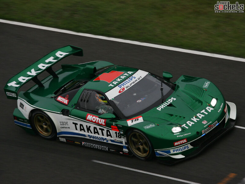 green race car on track