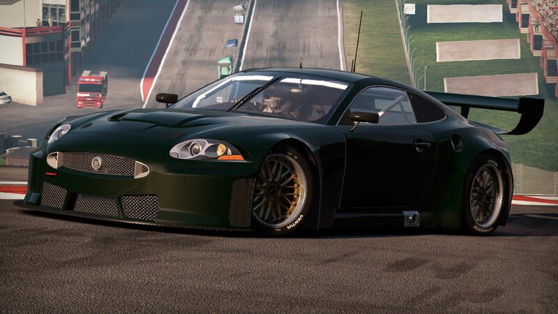 green race car on track