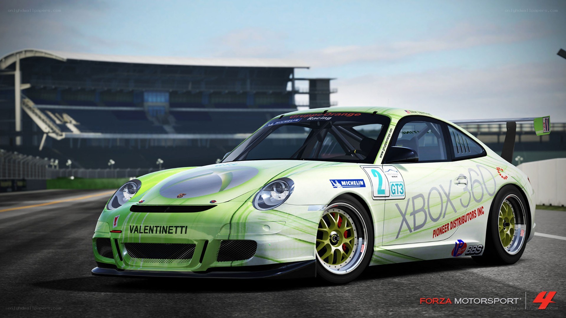 green race car on track