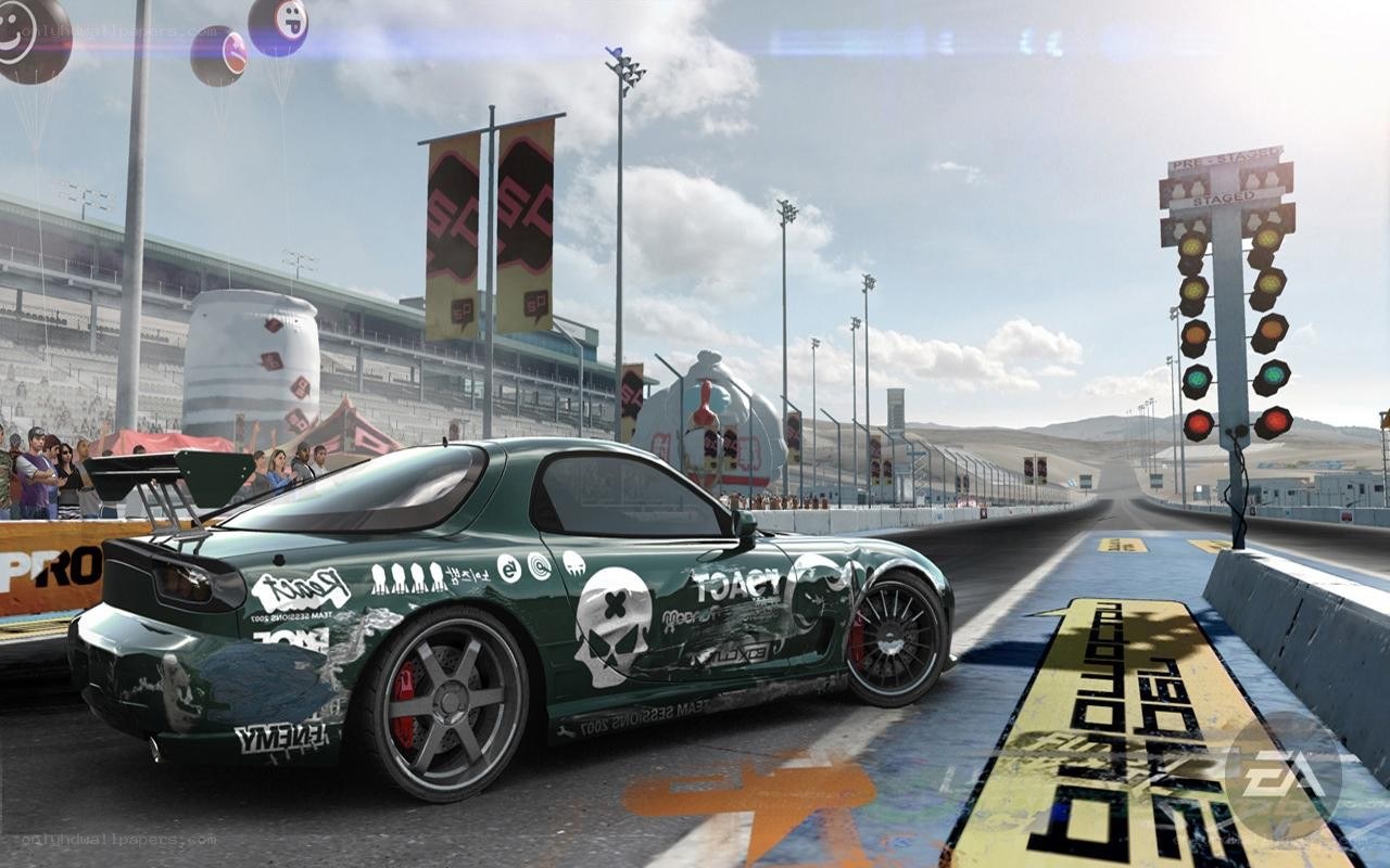 green race car on track