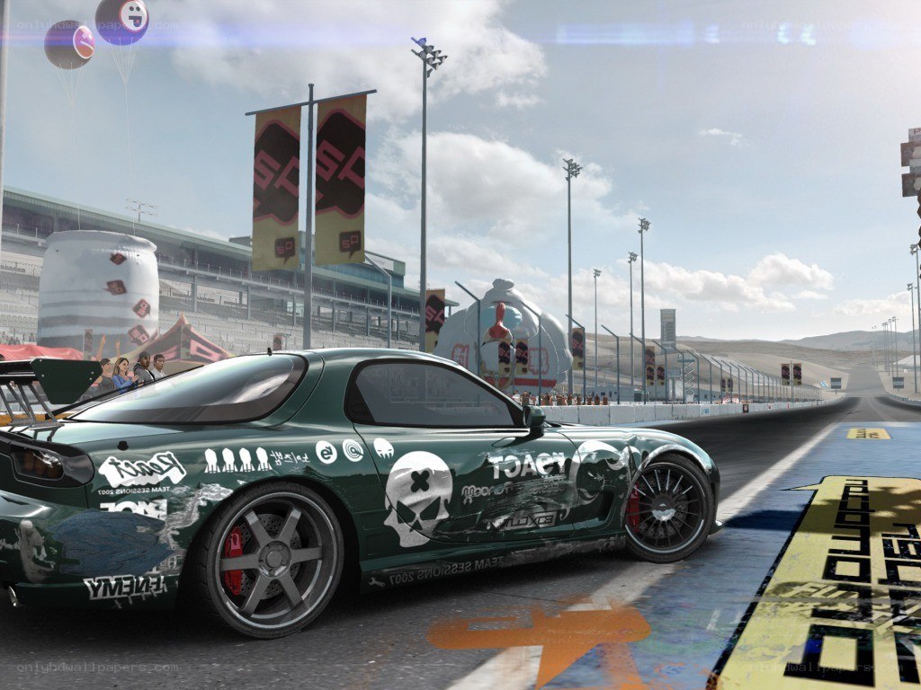green race car on track