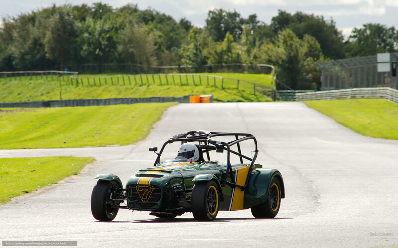 Green Race Car on Track — Active, Afternoon, Photograph, Driver, Race Track
