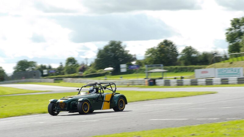 Green Race Car on Track — Active, Afternoon