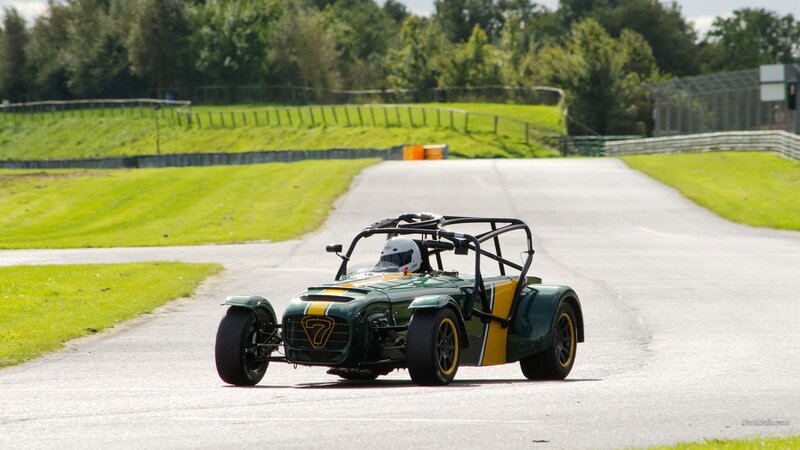 Green Race Car on Track — Active