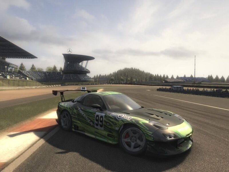 Green Race Car on Track — Calm, Afternoon