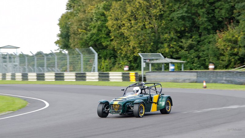 Green Race Car on Track — Dynamic, Afternoon, Photograph, Driver, Race Track, Trees